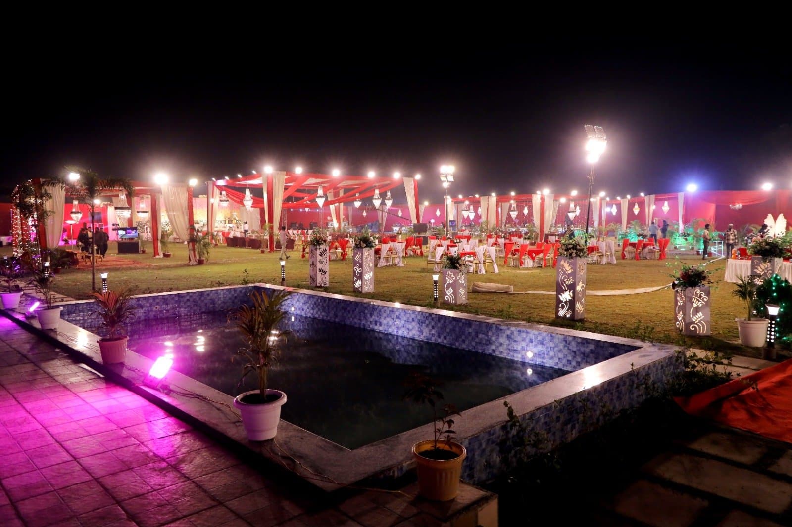 Royal wedding celebration pavilion illuminated at night in Lucknow